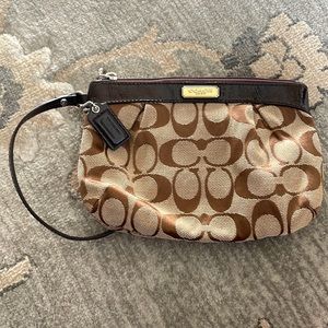 Coach wristlet. Brown and beige